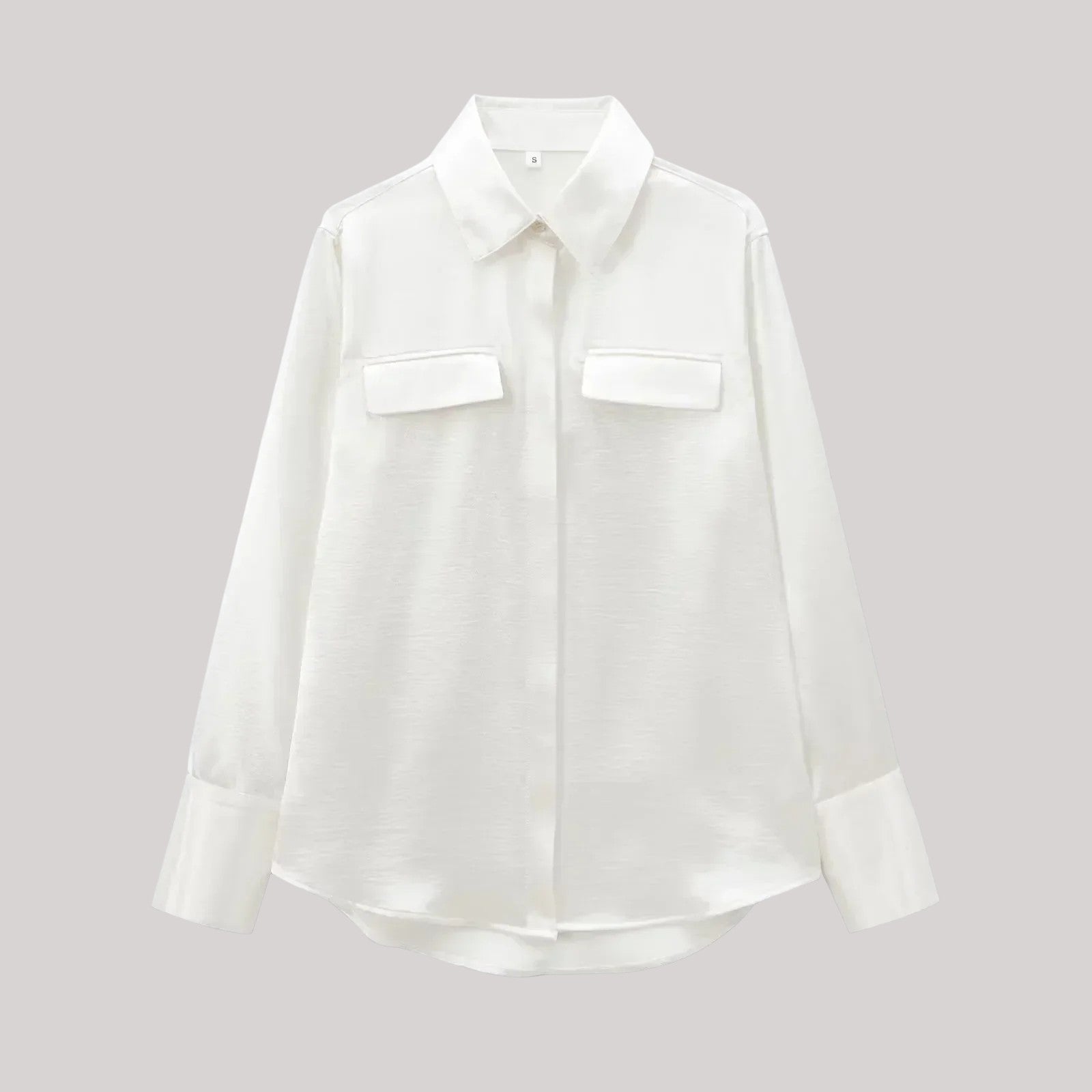 Léocadie | Glansig blus med detalj