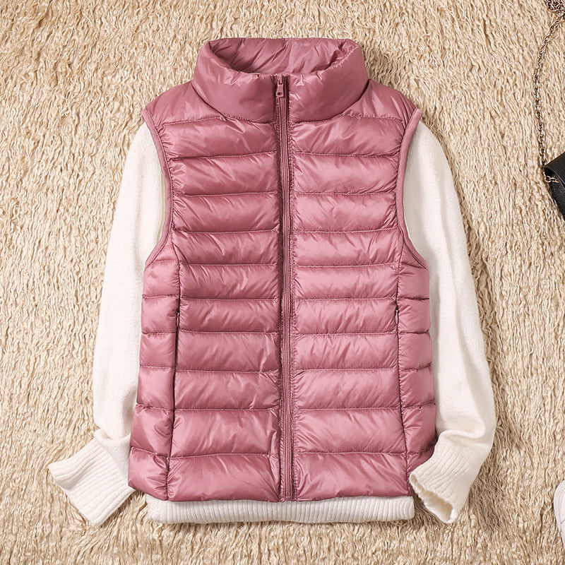 Stockholm Atelier™ | Galora - Ny väst med vita ankfjädrar