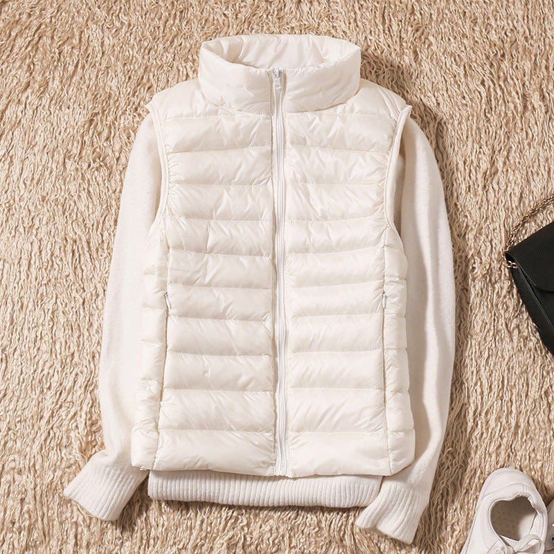 Stockholm Atelier™ | Galora - Ny väst med vita ankfjädrar