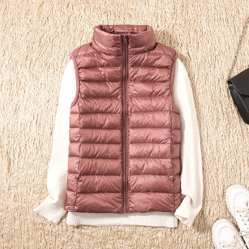 Stockholm Atelier™ | Galora - Ny väst med vita ankfjädrar