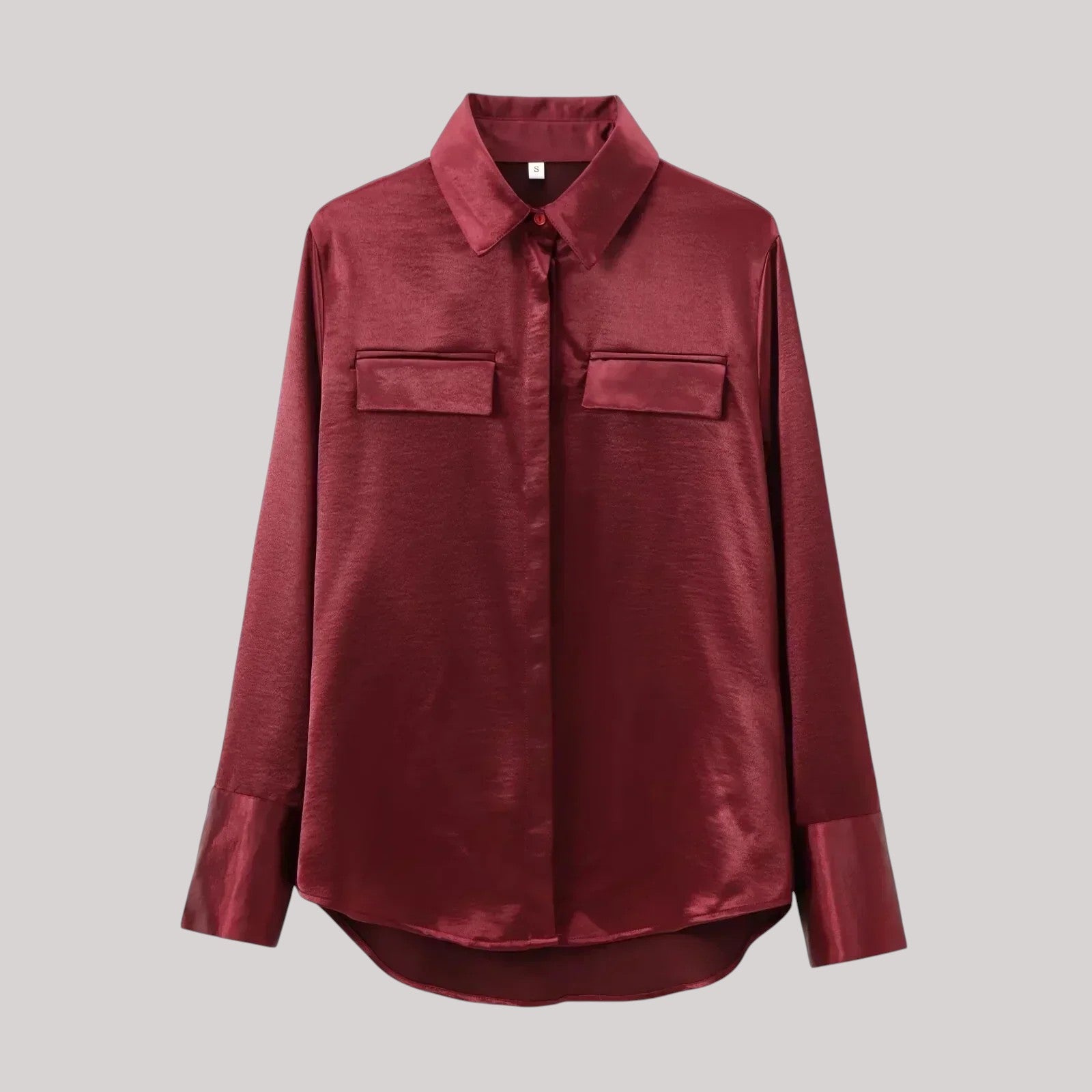 Léocadie | Glansig blus med detalj